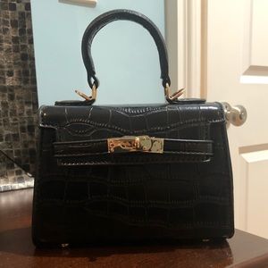 Mini black top handle bag